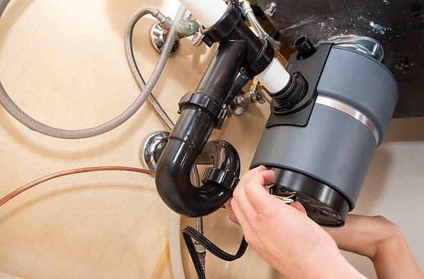 installing-garbage-disposal Comprehensive Garbage Disposal Services